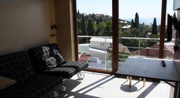 Фото номера Номер-студио с видом на сад Апартаменты Simeiz apartment г. Симеиз 2